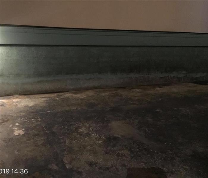 Water Line on Concrete Wall